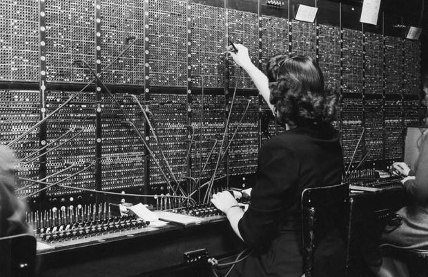 A telephone switchboard operator. 