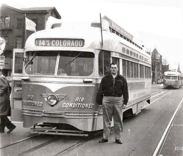 I am standing in front of a PCC car on the last day of streetcar service in Washingtton D.C., Jan 1962 (Saul Nadler)