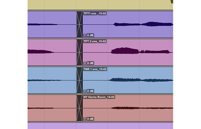 Listen to make sure the edit point is completely inaudible. If multiple mics were open in the room at once, as with this horn section, the resulting bleed or spill will mean it usually sounds the most natural to edit and crossfade in groups. 