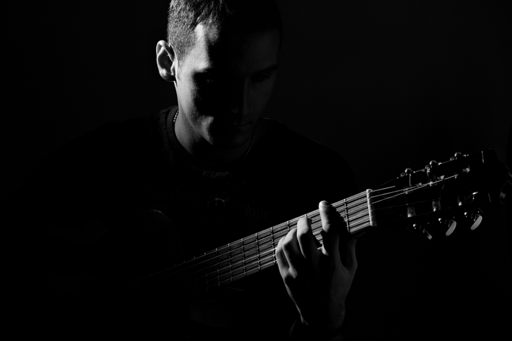 black and white photo of guitarist
