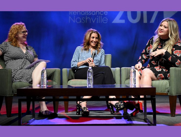three women on stage at music conference
