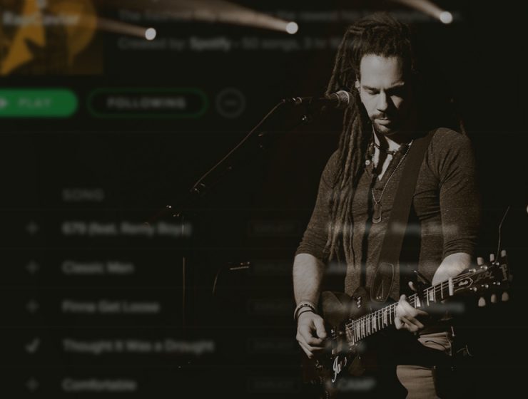 man playing guitar overlay with spotify