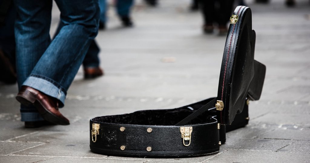 empty guitar case on the street