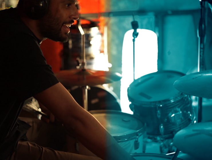 man recording drums