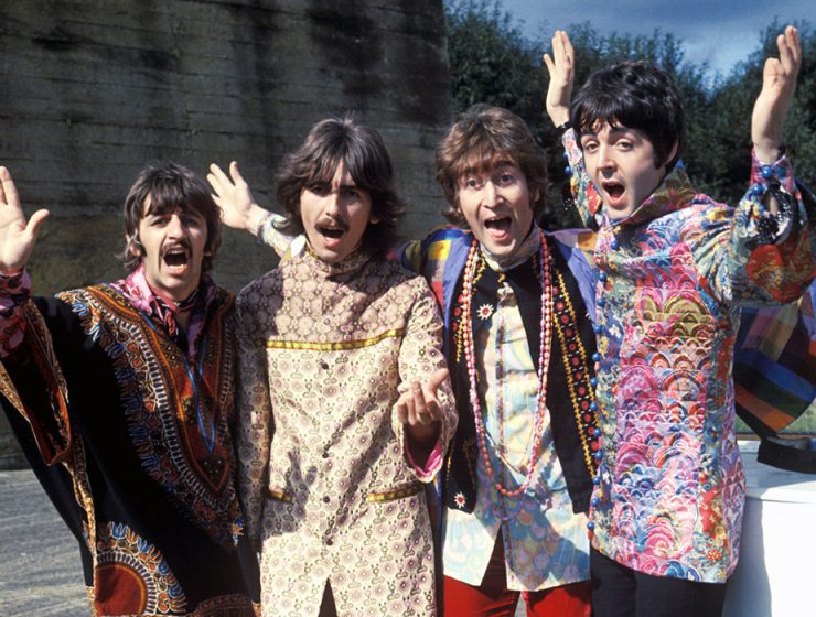 The Beatles singing in Indian clothing