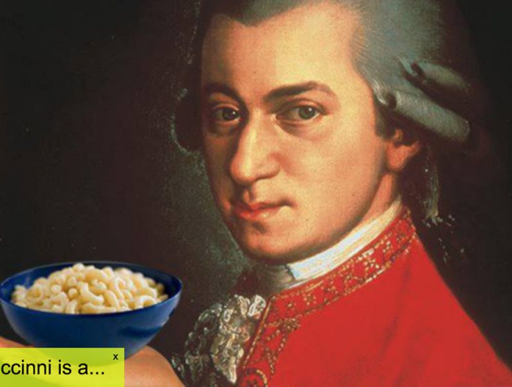 Mozart holding pasta with quiz language at bottom
