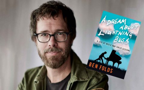 Ben Folds posing with his book A Dream About Lightning Bugs