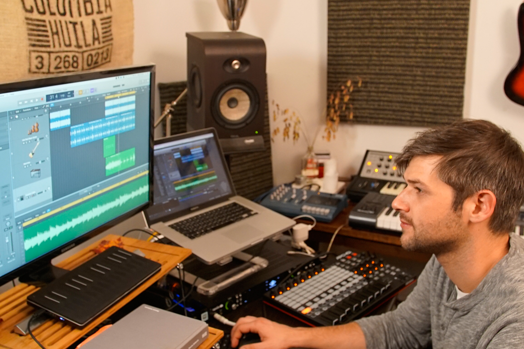 man producing music in Logic Pro