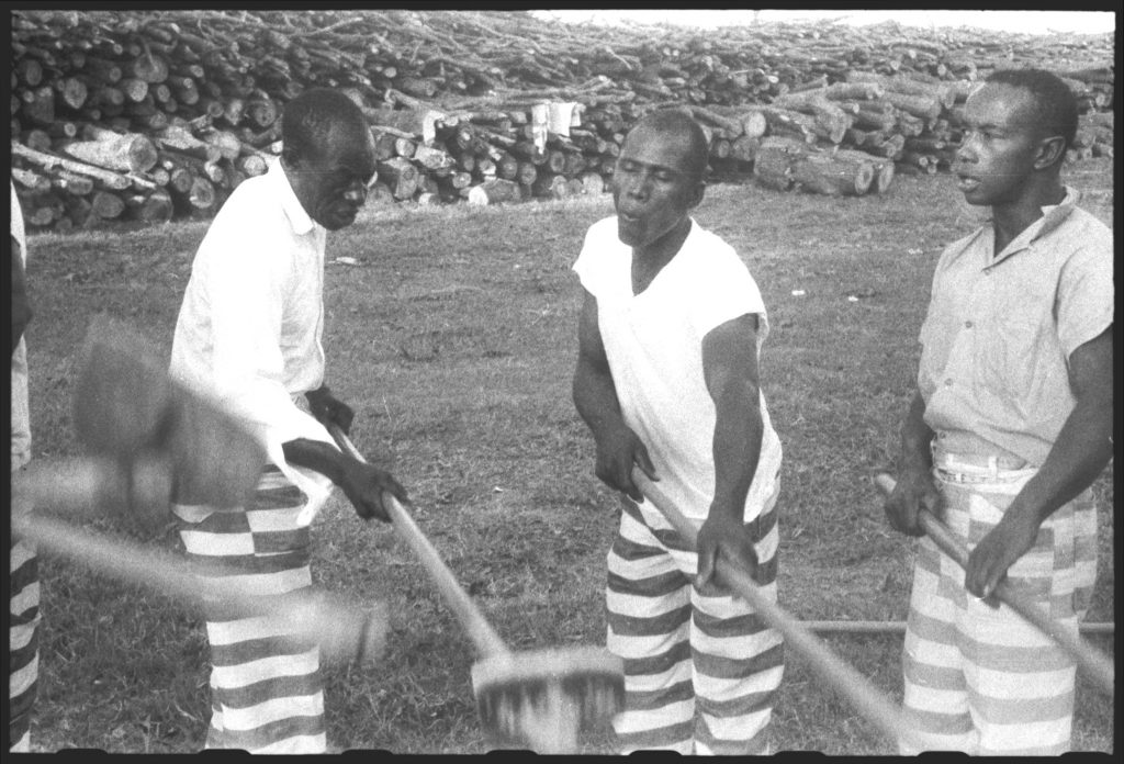 Prisoners singing while working at the Mississippi State Penitentiary (Parchman Farm), 1959.