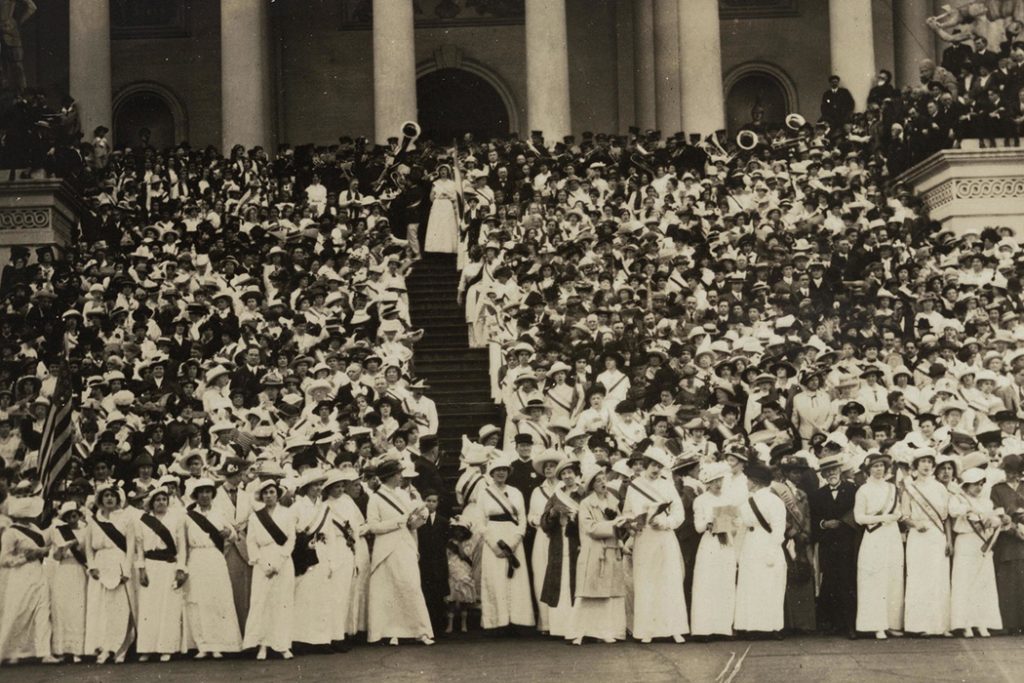 Congressional Union for Woman Suffrage petitioners on the steps of the United States Capitol, 9 May 1914. Those in the front line are singing "The March of the Women."