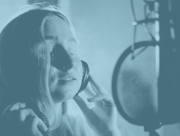 girl singing in studio
